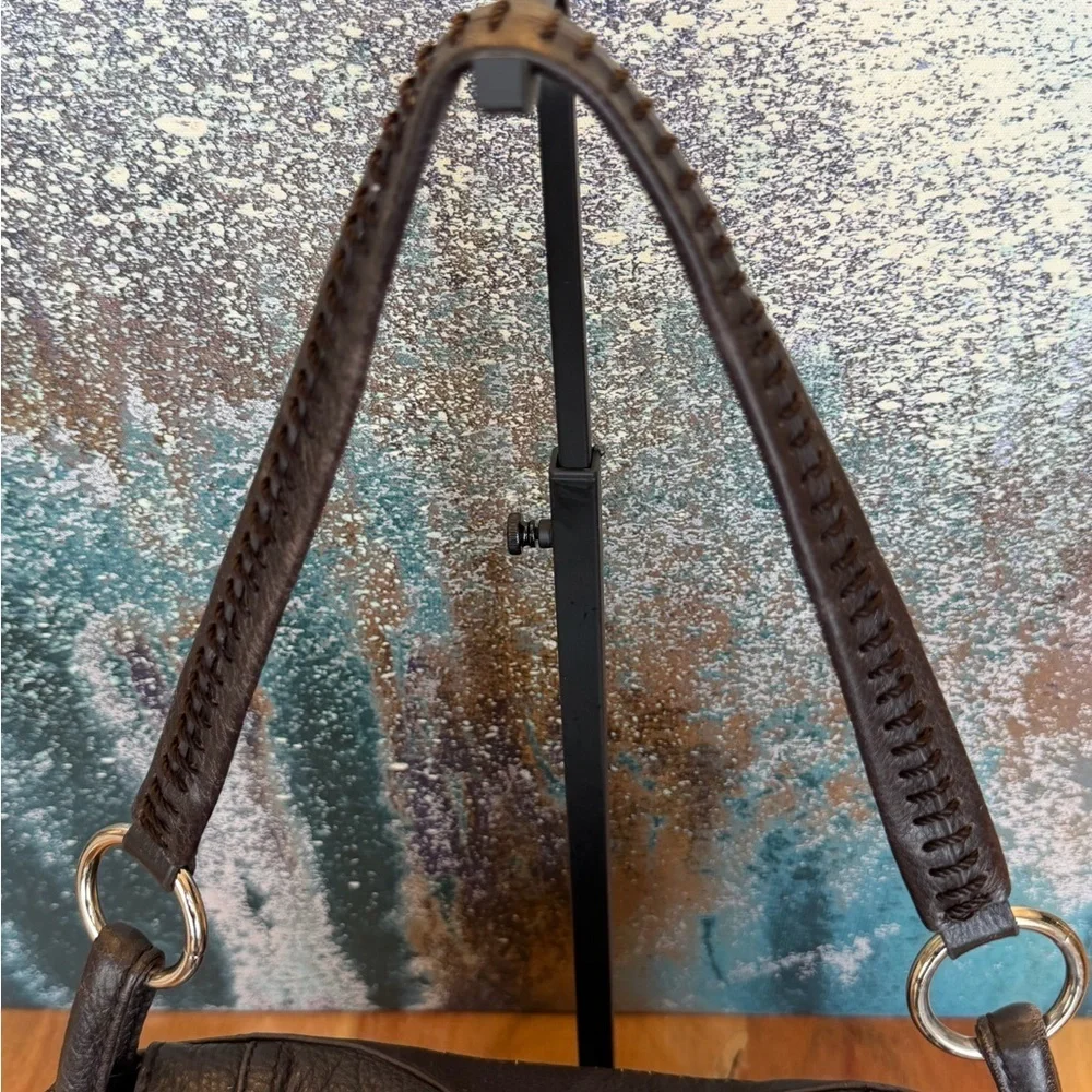 The Sak 2010’s “Deena Flap” Shoulder bag in chocolate brown